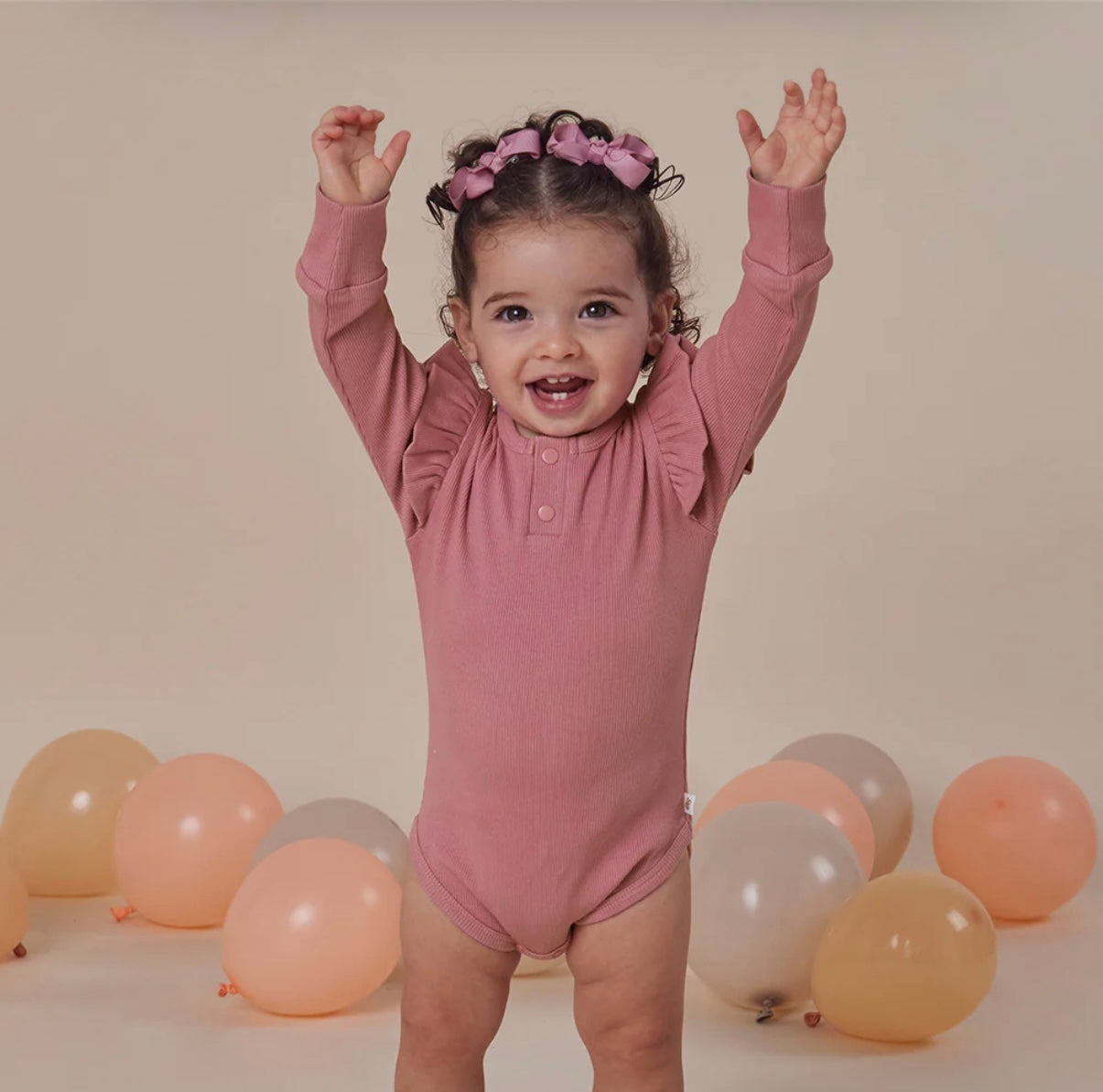 Snuggle Hunny Jewel Pink Rib Long Sleeve Bodysuit