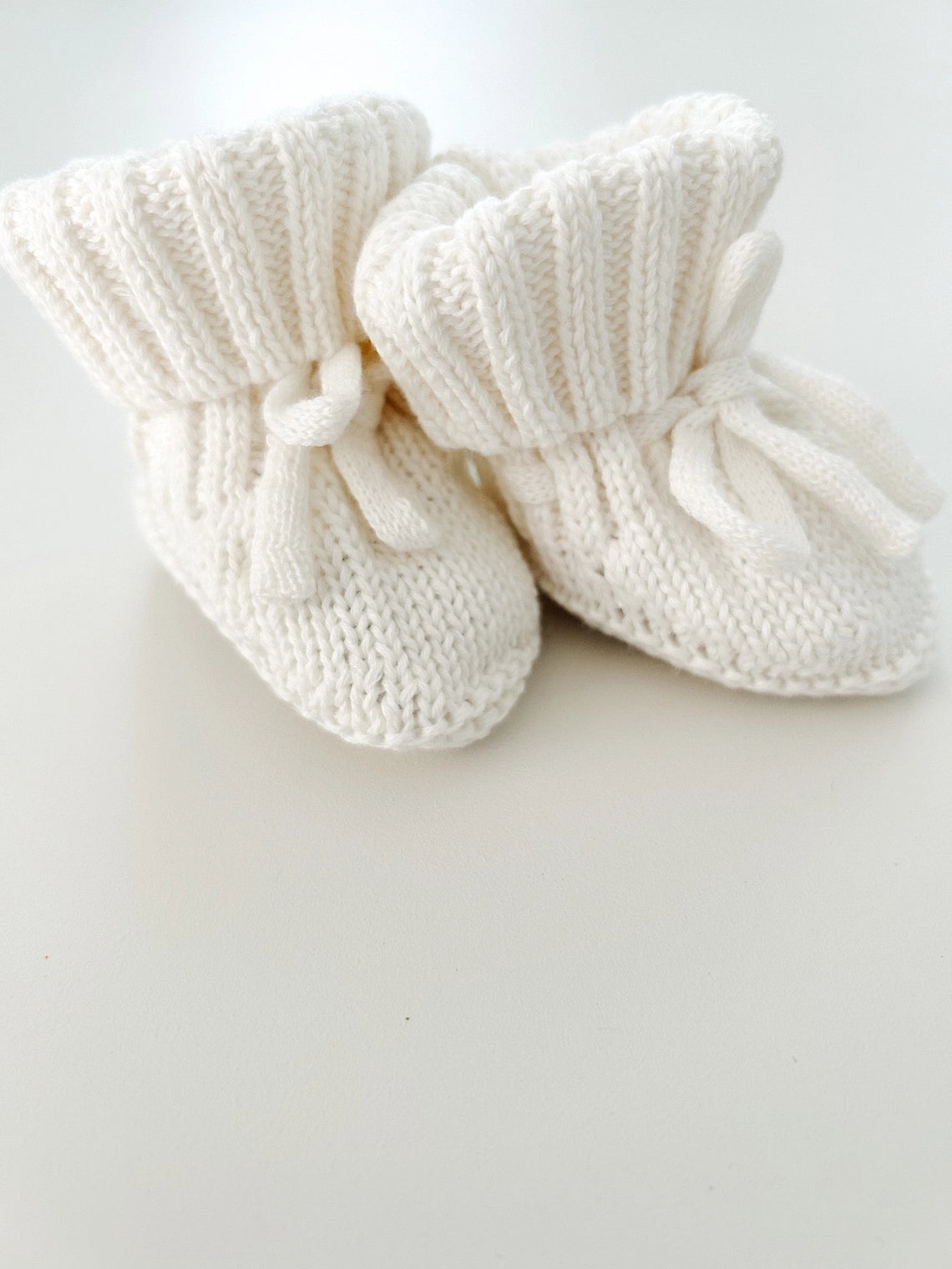 Petite + Co Cuff Newborn Lace Booties Milk