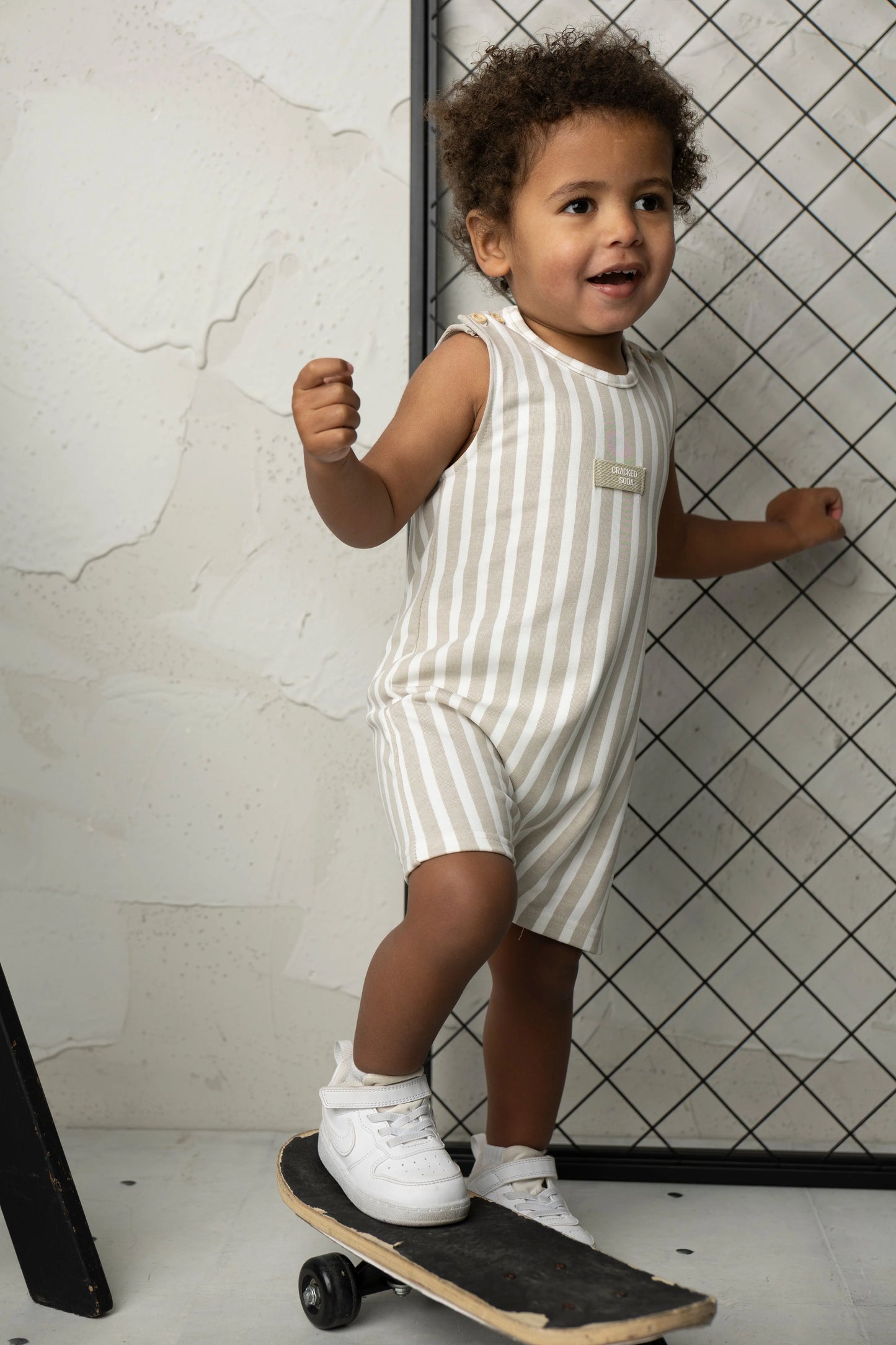 Cracked Soda Freddie Stripe Romper Pebble
