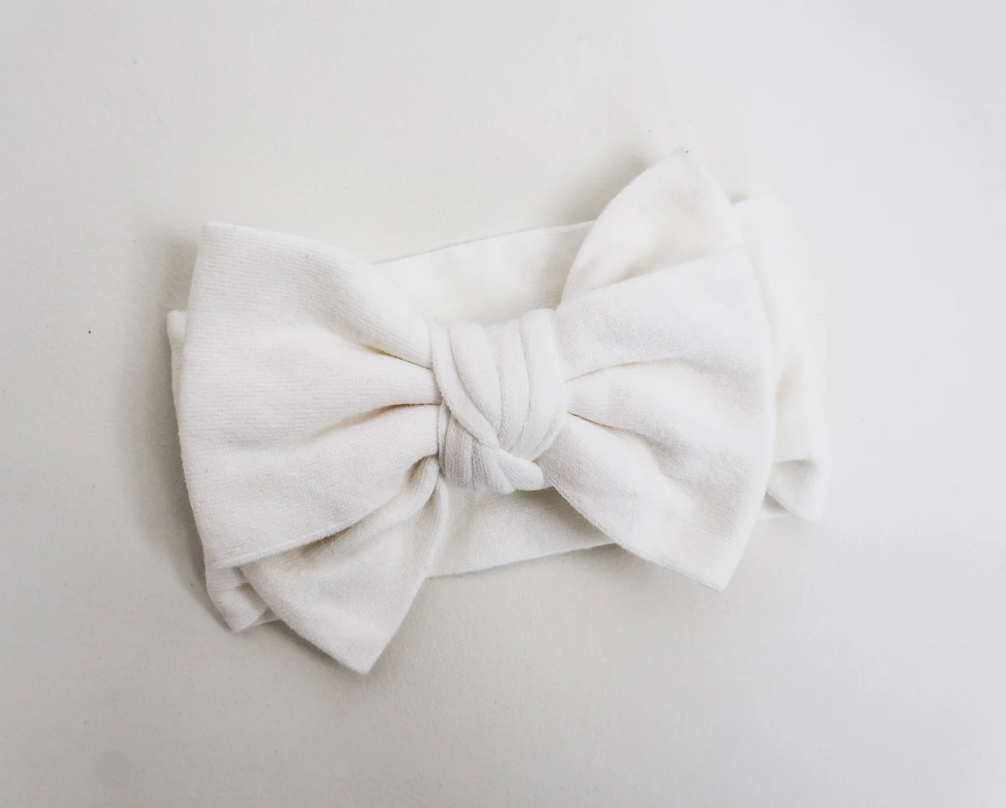 Petite + Co Fine Knit Bow Headband Milk