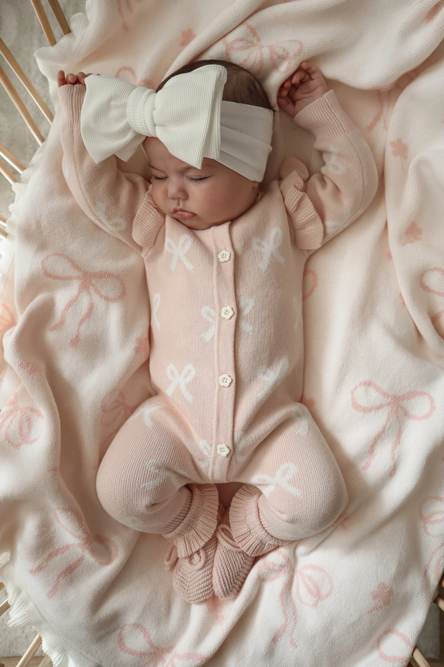 Petite + Co Long Flutter Bow Romper Baby Pink