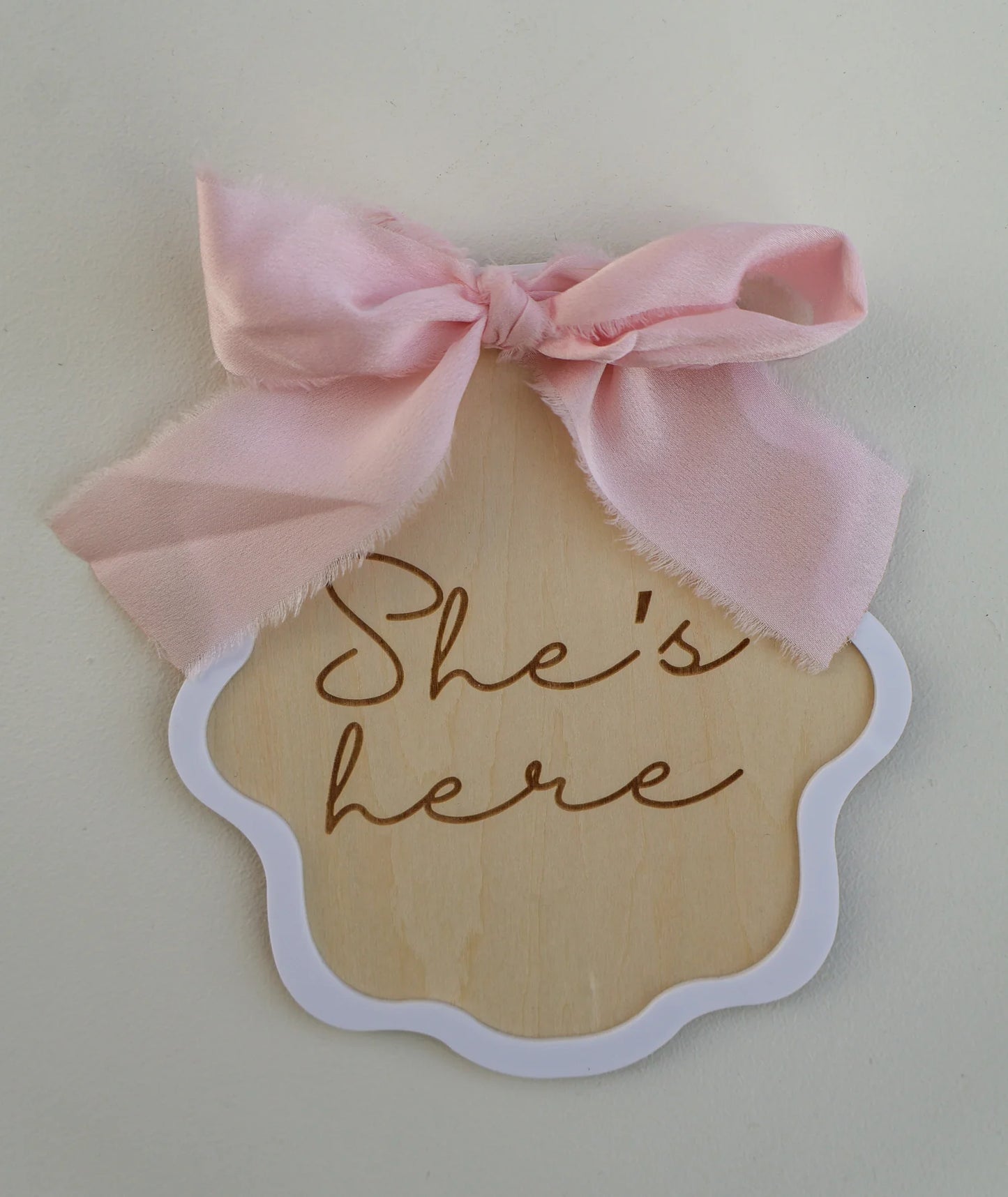 Petite + Co ‘She’s Here’ Pink Bow Plaque