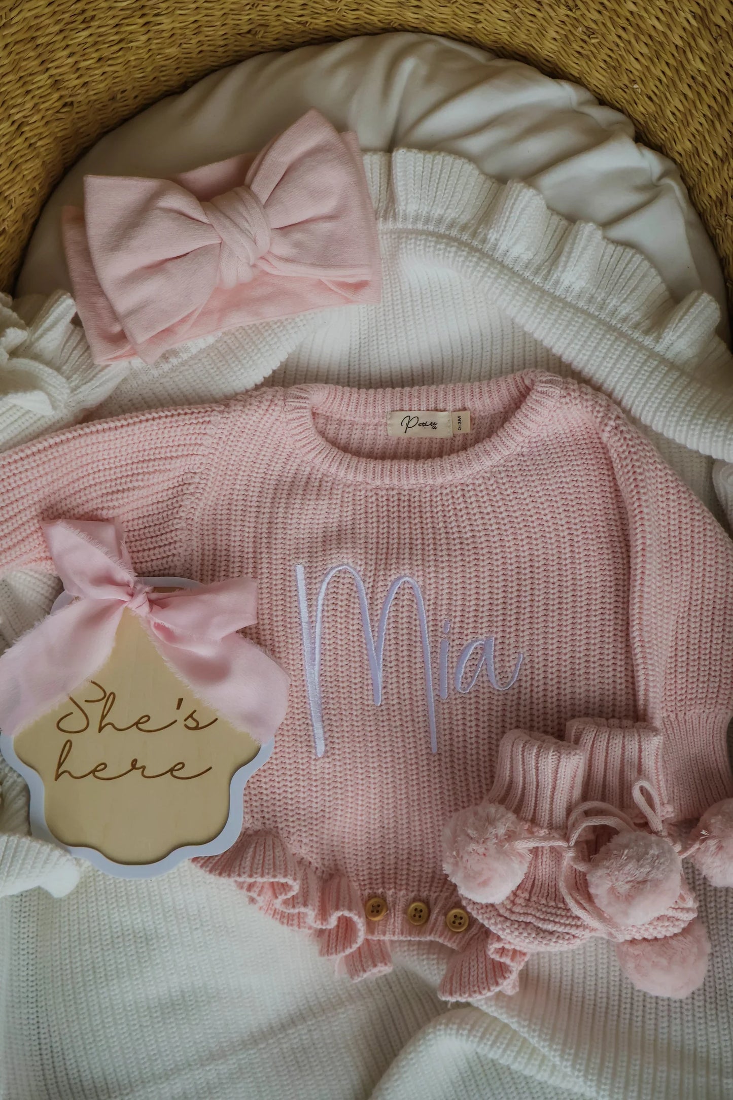 Petite + Co ‘She’s Here’ Pink Bow Plaque